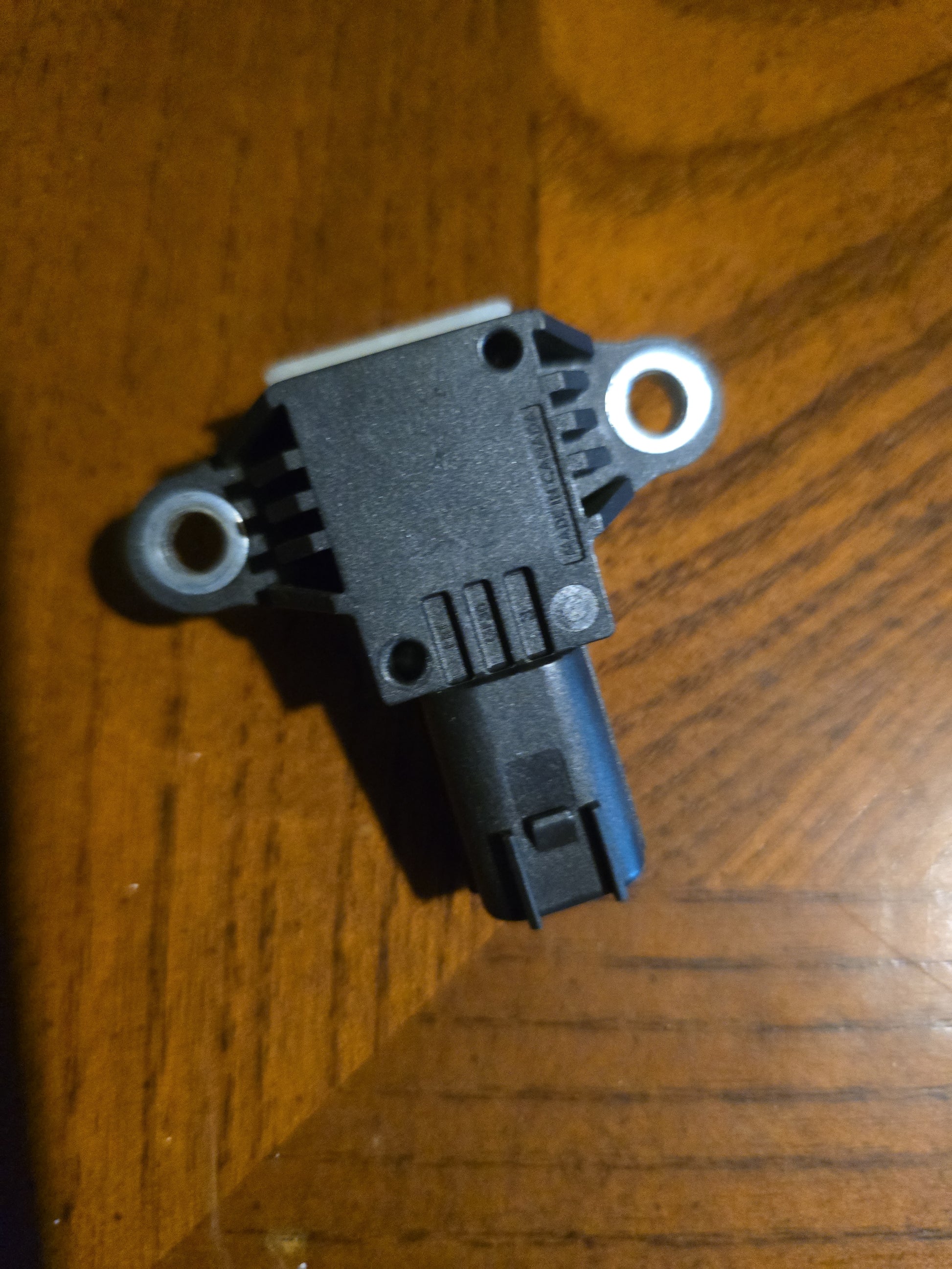 OEM Airbag Crash Sensor removed from a 2011 Kia Sorento.